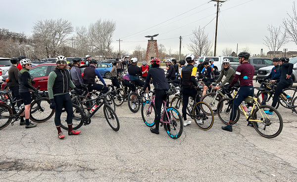 a group of cyclists getting ready for a ride