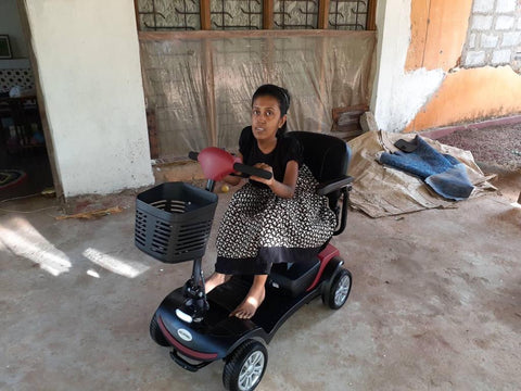 Chamila with her new Mobility Scooter