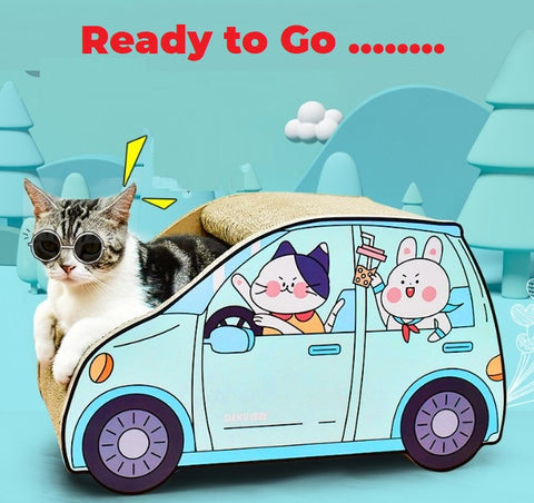 A cat in a SmartSUV™ Cat Car, ready to go.
