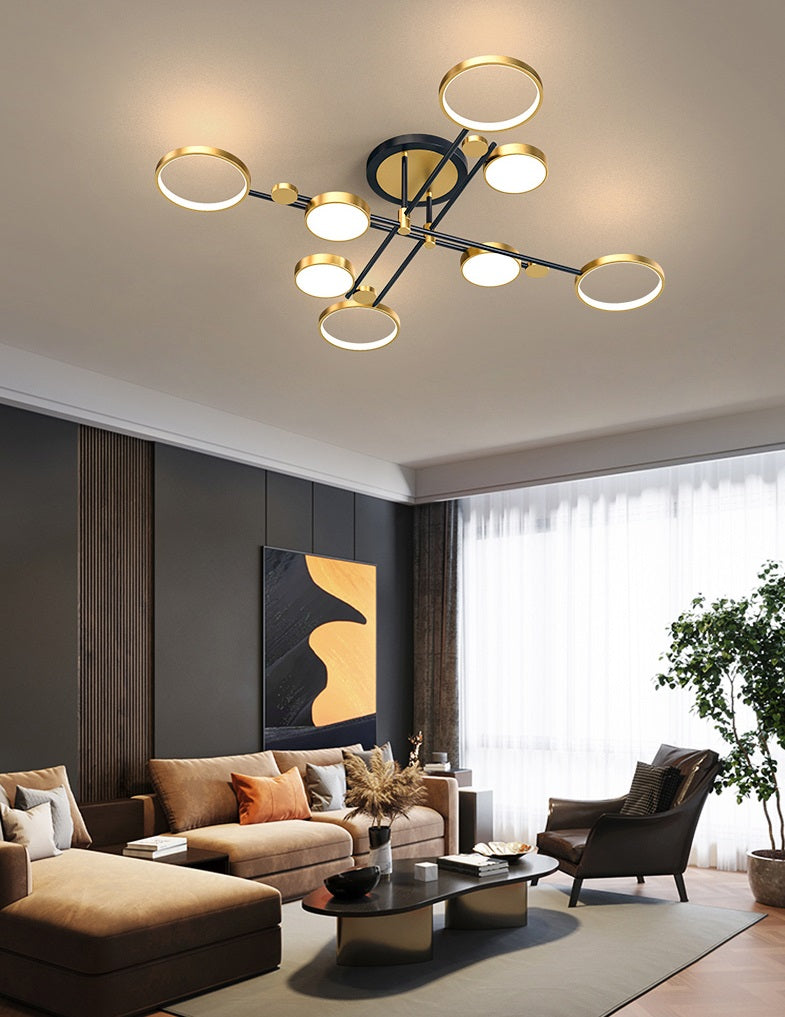 Modern living room with stylish furniture and a striking Atomic Starburst Ceiling Light.