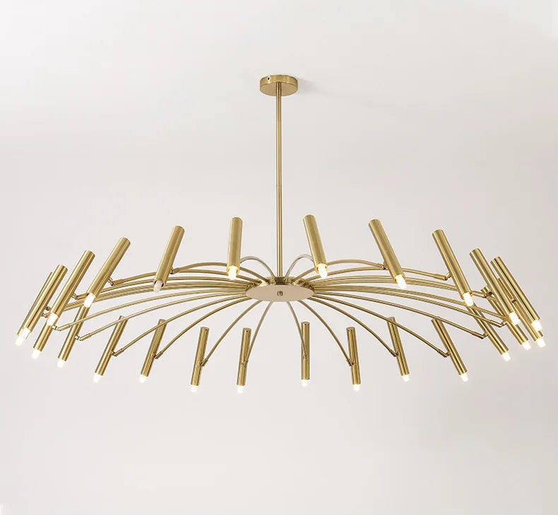 An elegant gold chandelier with adjustable lighting, hanging from the ceiling.