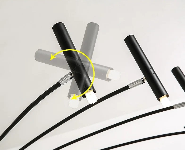 A black and yellow lamp with adjustable lighting due to rotatable design of the lamp holder.