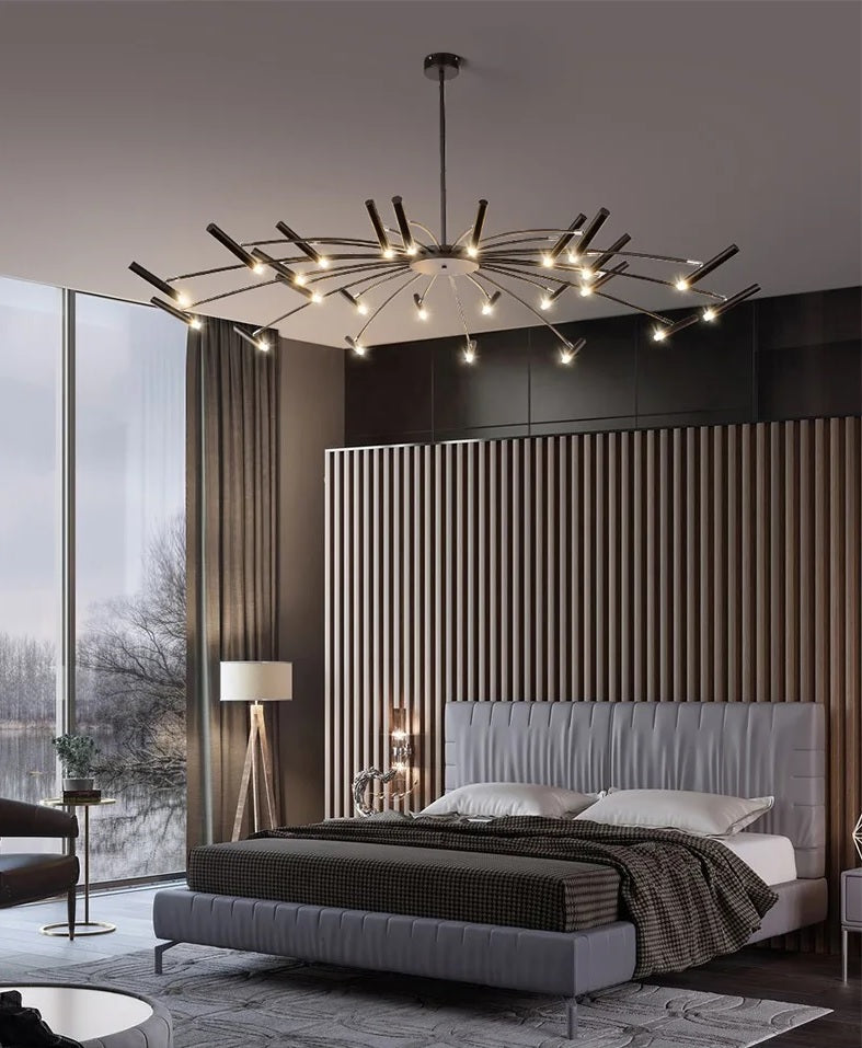 A modern bedroom with a large bed and an elegant, Contemporary Candle Style Chandelier providing adjustable lighting.