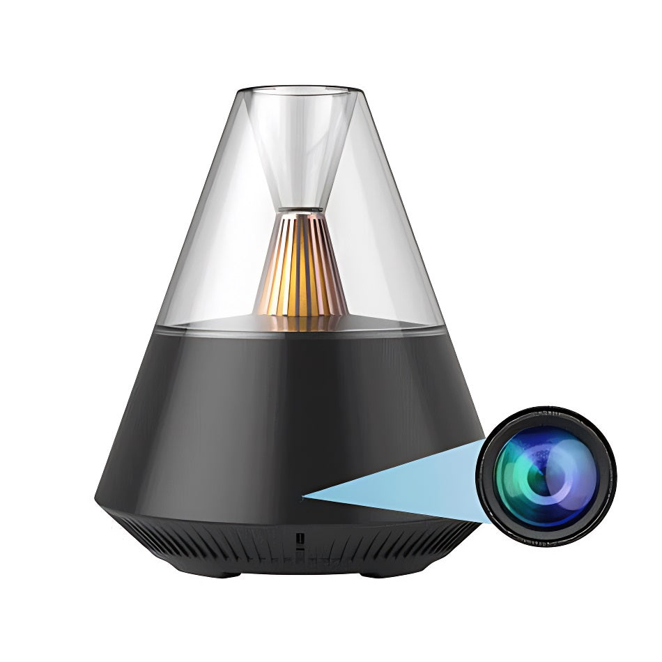 Modern essential oil diffuser with a clear, cone-shaped design.
