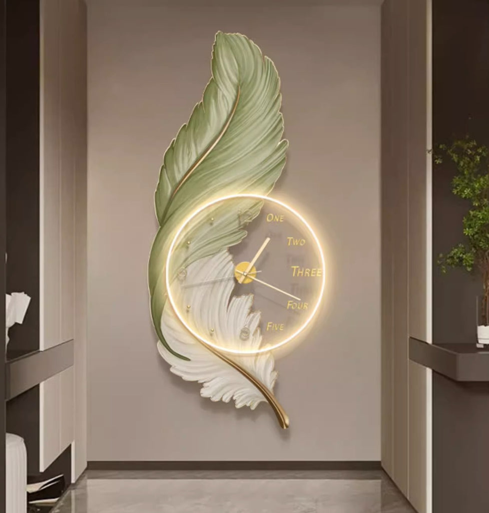 An upgraded wall clock adorned with a vibrant green leaf.