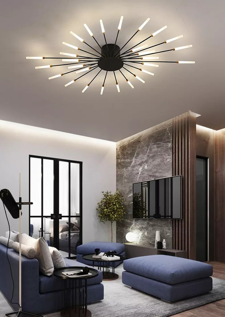 A modern living room with a brushed antique gold finish for the Magic Wand Ceiling Light.