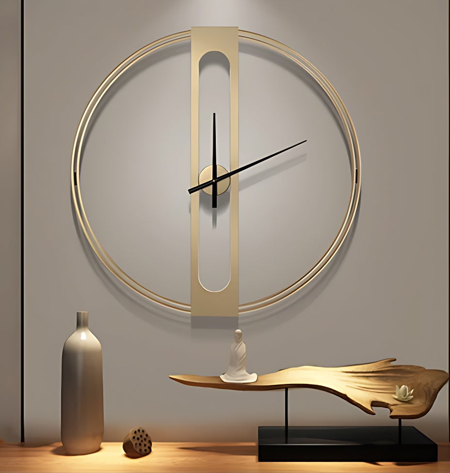 Modern wall clock with minimalist design, featuring a large circular outline and a smaller oval centerpiece on an elegant wooden shelf with decorative items to beautify your space.