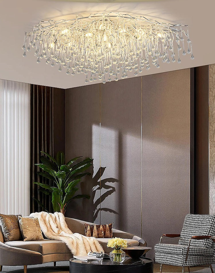 A modern living room with an opulent crystal chandelier.