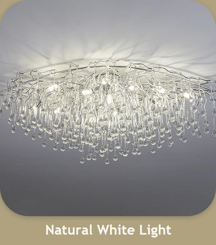 A luxury crystal chandelier with a natural white light.