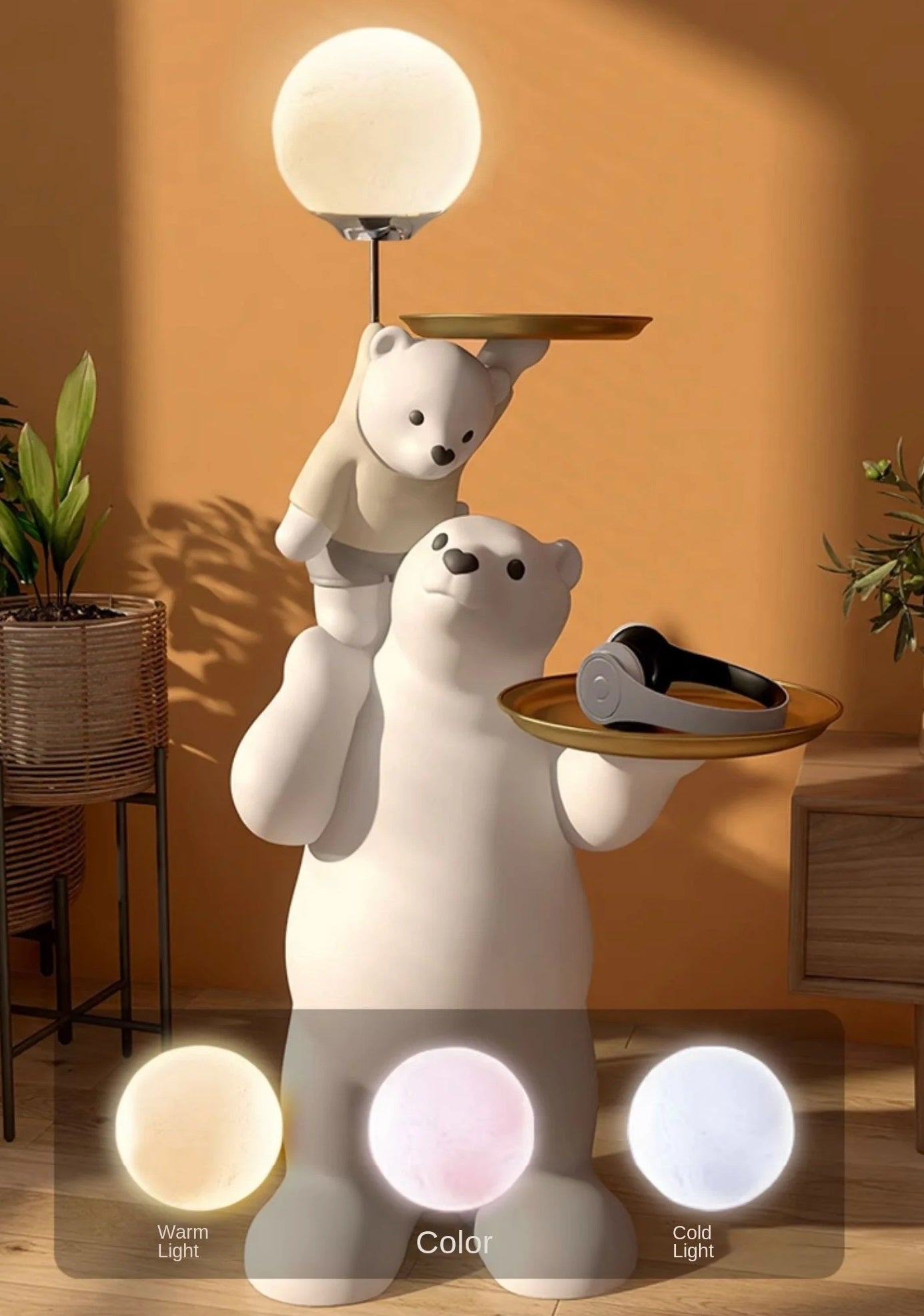 Decorative lamp featuring a polar bear with a smaller bear balancing a luminous globe on its nose, set against a warm orange background with samples of light temperatures shown below, perfect as a furniture piece for home decoration.