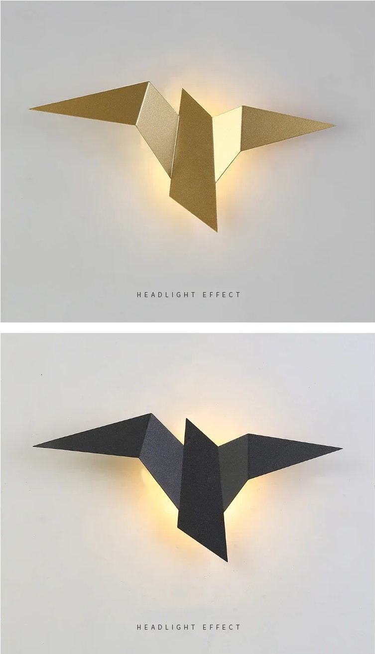 Geometric wall-mounted lights demonstrating a 'headlight effect' when illuminated, known as the Flying Bird Wall Sconce.