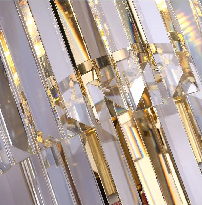 A close up of a modern crystal chandelier.