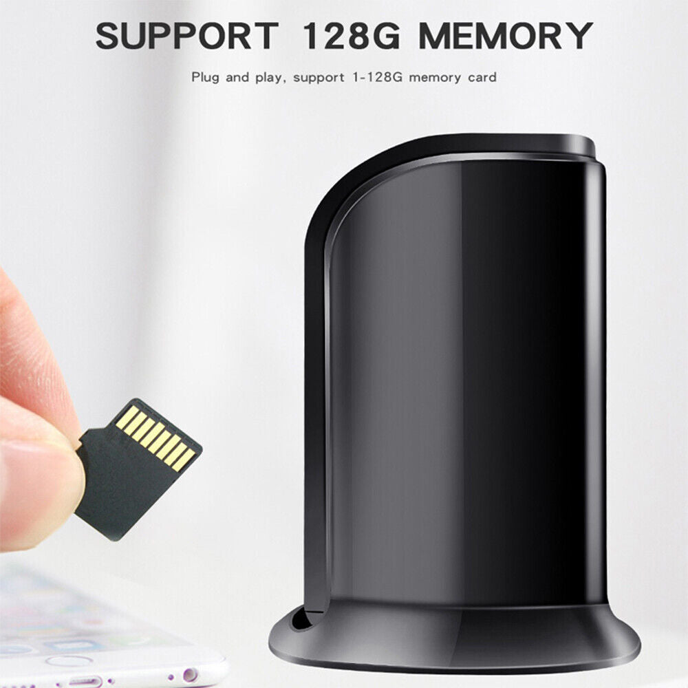 Black external hard drive with a micro sd card being inserted, next to a smartphone and a SpyCam Charger Hub, against a white background. Text: plug and play, support 128GB memory card