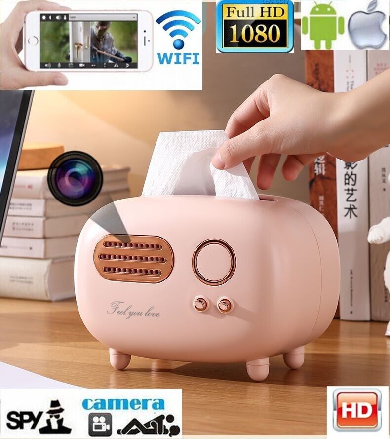 A pink Tissue Box SpyCam holder with a hidden camera feature advertised as compatible with mobile devices and capable of full HD recording, ideal for discreet surveillance tactics.