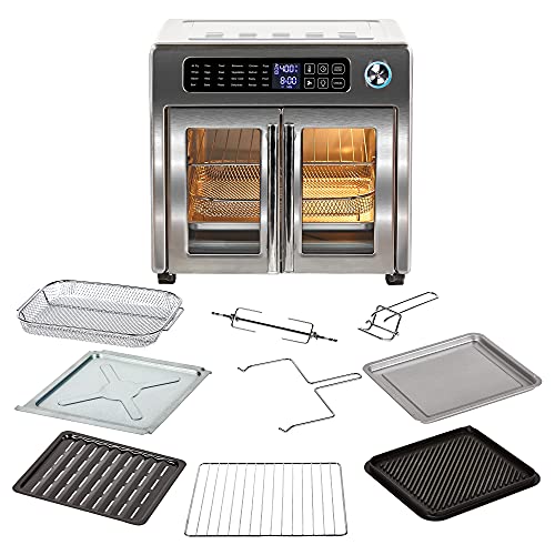 A stainless steel toaster oven with trays and pans for cooking.