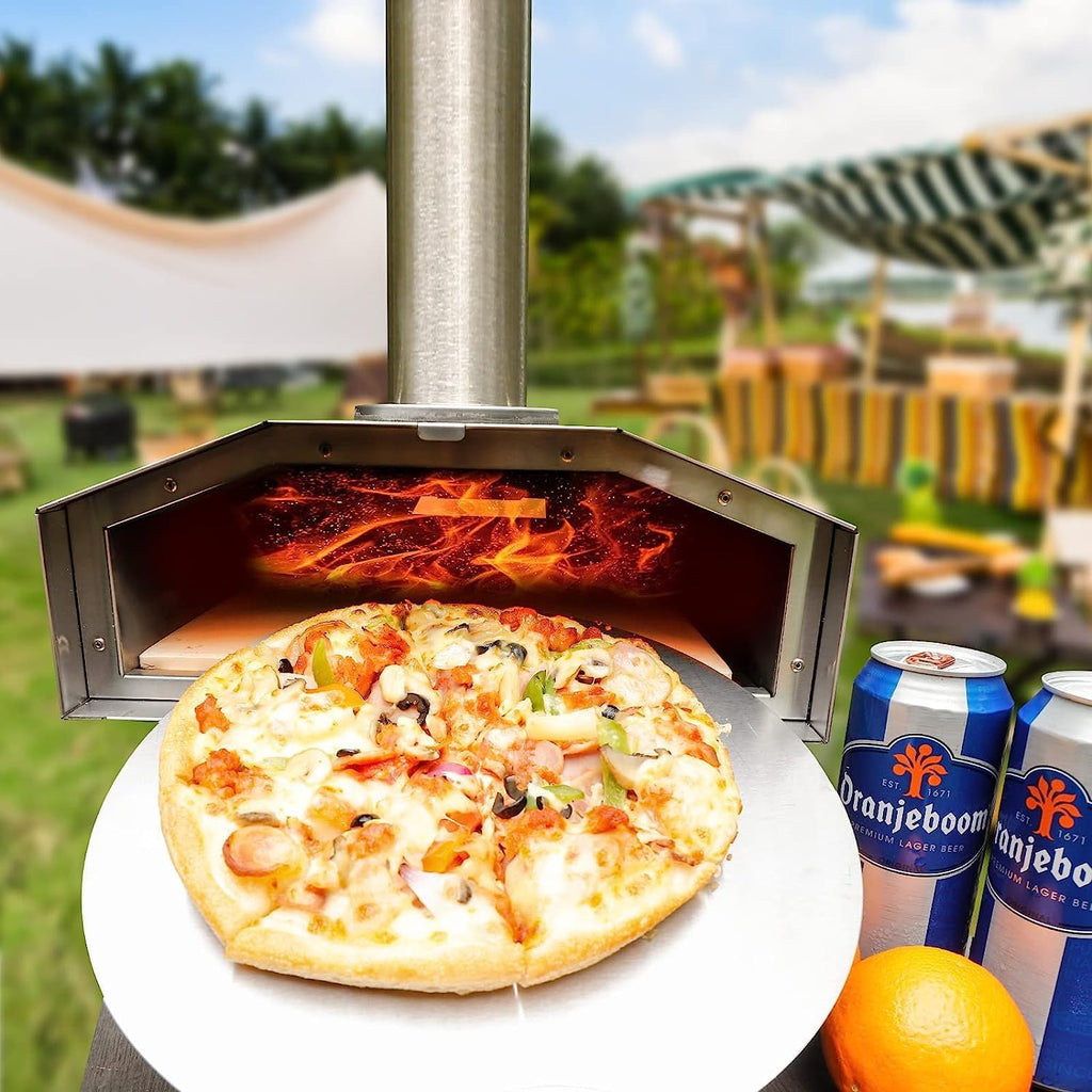 A delectable pizza is being cooked in an outdoor portable pizza oven, creating a culinary celebration.