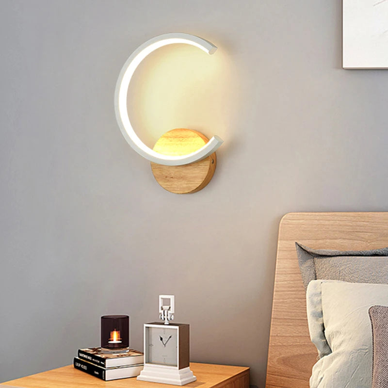 A bedroom with a white Nordic Wall Sconce for lighting excellence.