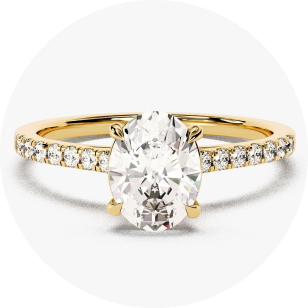 Yellow gold engagement ring with sidestones