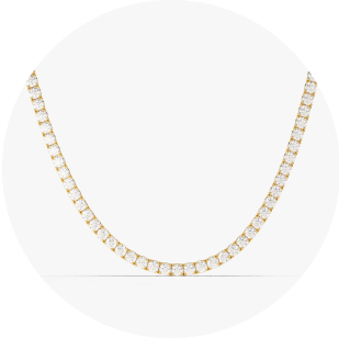 Eternate's yellow gold tennis necklace in front of white background
