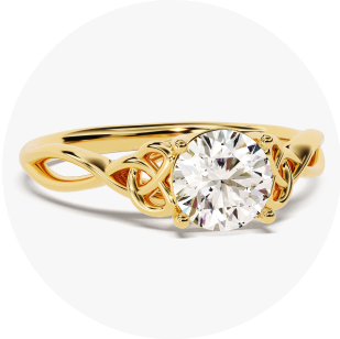Eternate's yellow gold art deco moissanite engagement rings in front of white background