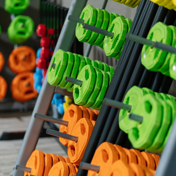 Colorful weight plates on the rack
