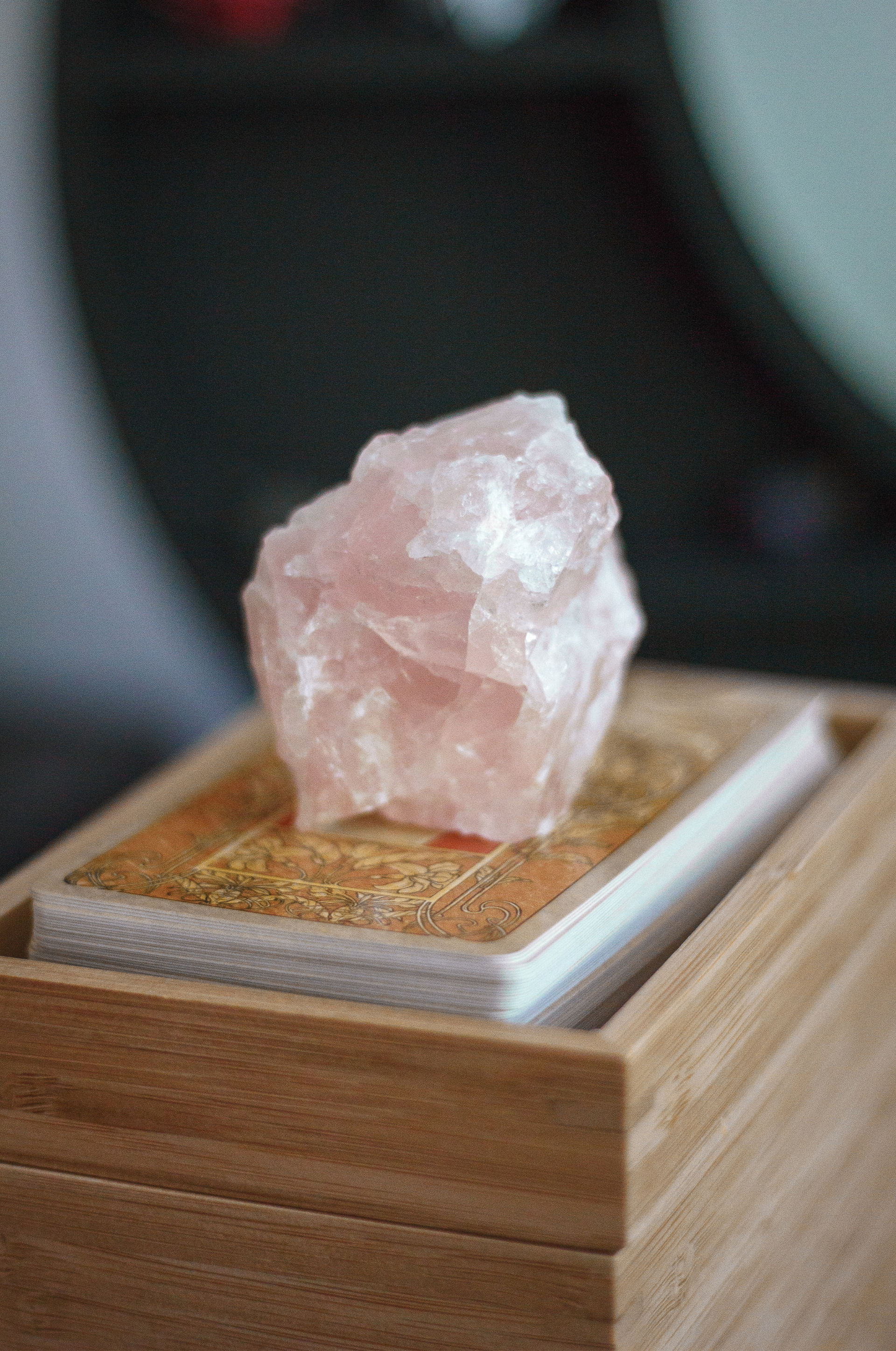 rose quartz on tarot cards