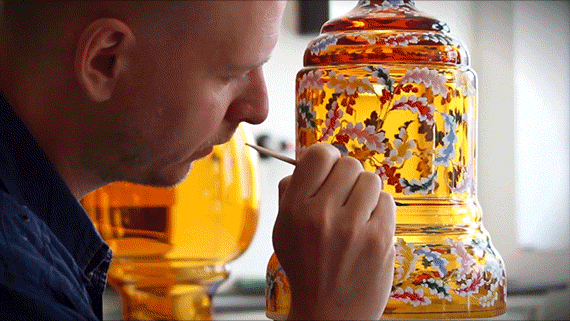 Jan Janecky from Moser Glassworks carefully painting on the historical Menuet pattern on crystal vase