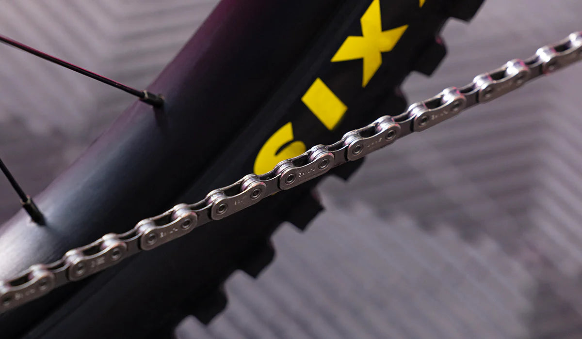 MTB bike chain after application of Muc-Off All Weather Lube, visibly smoother and well-lubricated