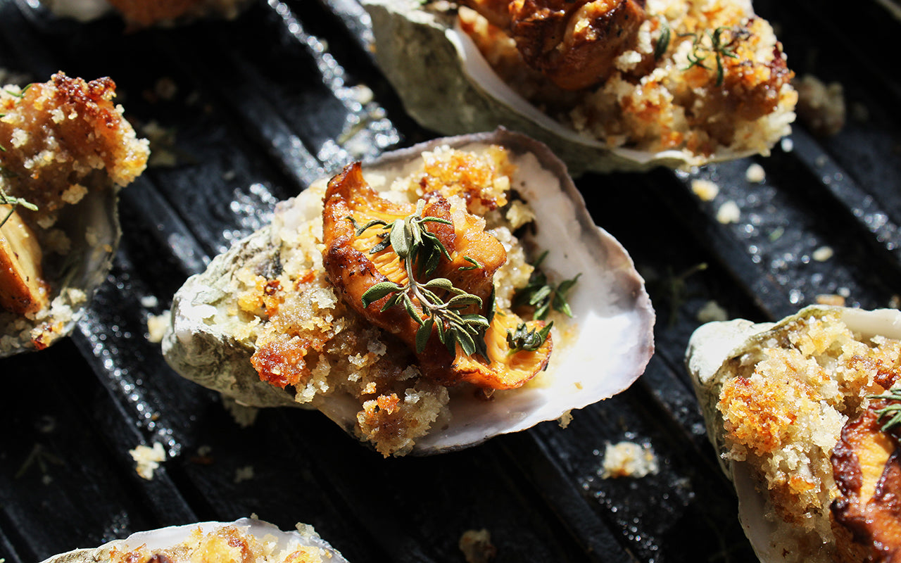 oysters broiled with chanterelles and sausage