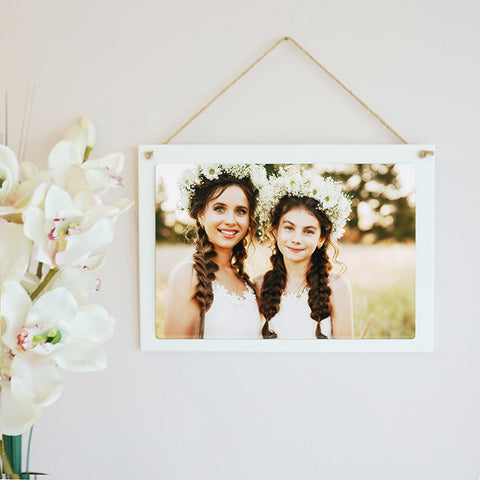 A white coated wooden rectangular hanging sign from the PhotoSplash HomeSplash collection, suspended by rustic twine and showcasing a photo, logo, or monogram with outstanding color reproduction