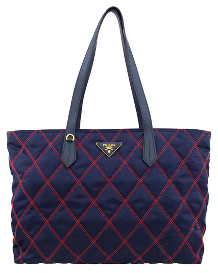 Pre-Owned Louis Vuitton Empreinte Montaigne GM in Marine and Rouge – Bremer  Jewelry