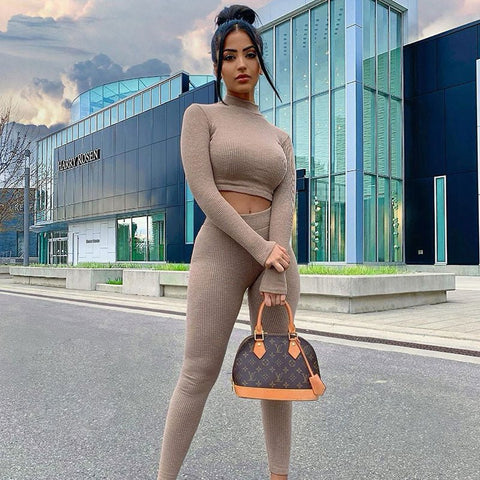 https://cdn.shopify.com/s/files/1/0485/2937/5395/files/two-piece-outdoor-outfit-set-long-sleeve-crop-top-leggings-738769_1_480x480.jpg?v=1669709152