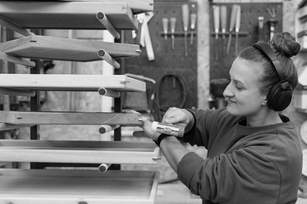 Image Credit - Photography by Jonny Brown, Martelo and Mo workshop, Monika inserting corner pins in the trays
