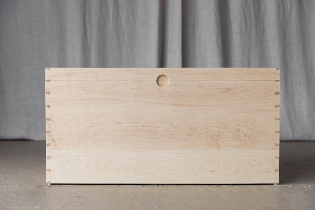 Maple Blanket Box by Martelo and Mo: Handcrafted from premium Maple wood, this elegant blanket box offers timeless style and ample storage space