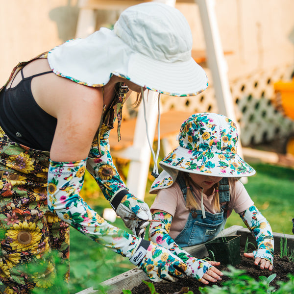 A mother and daughter enjoying the outdoors in UPF 50+ sun protection.