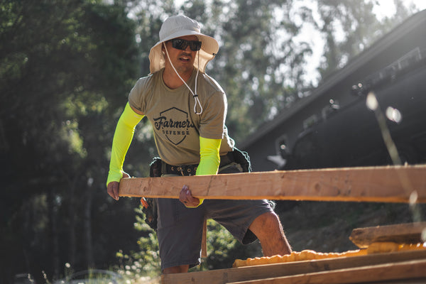 A construction worker wearing REPREVE sleeves.