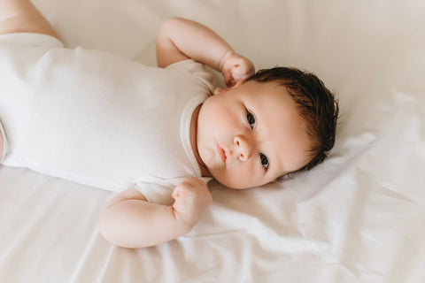 Newborn in a crib