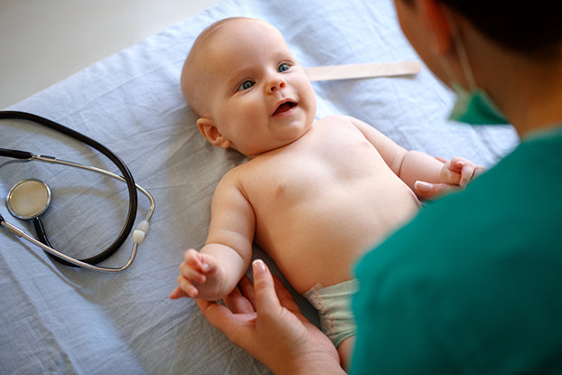 healthcare provider helping with baby congestion