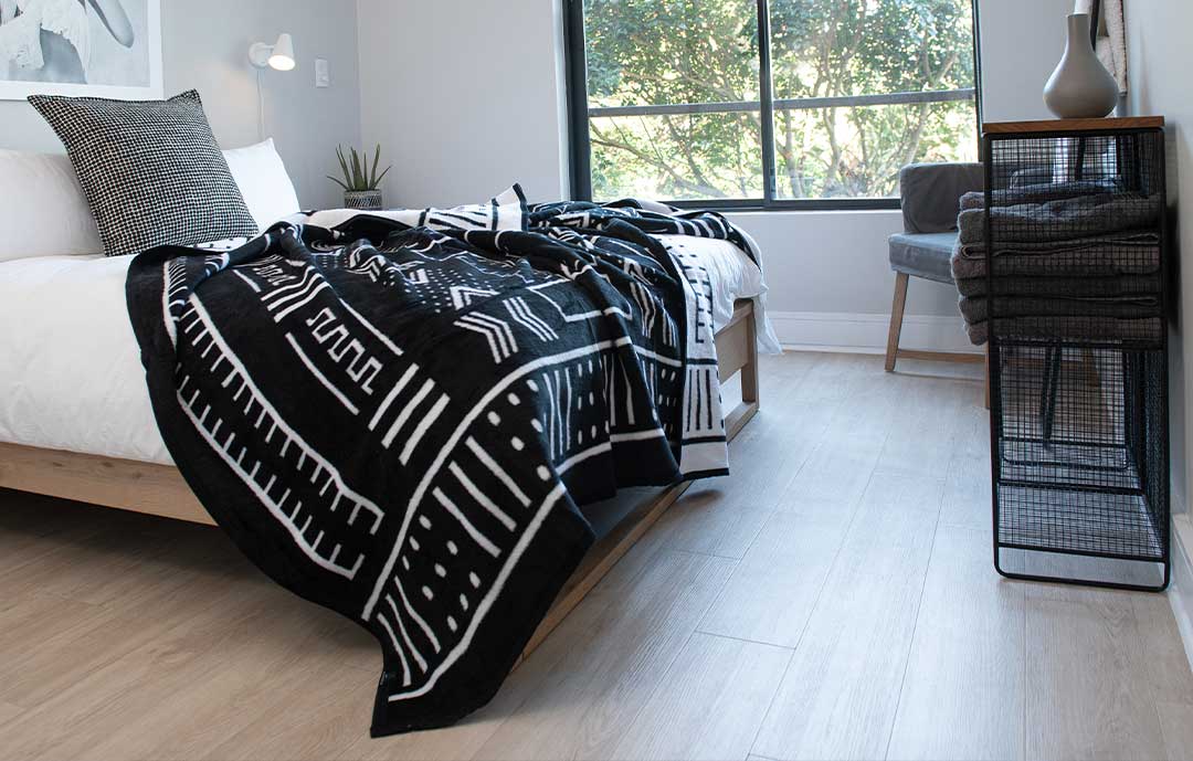 Black and white mali mudcloth on a modern bed
