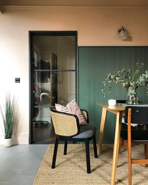 In this dining room, Farrow & Ball Setting Plaster and Green Smoke.