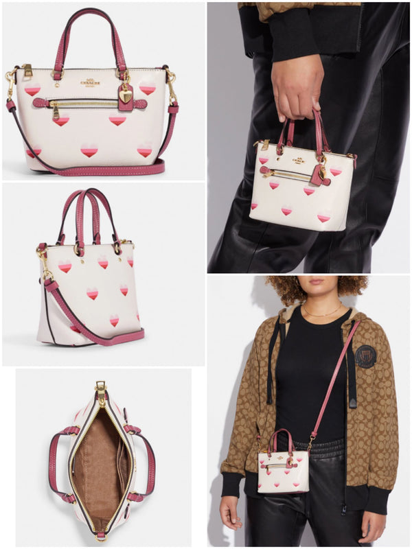 Coach Mini Gallery crossbody with stripe heart print.