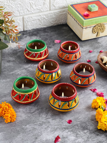 Handmade & hand-painted Terracotta & ceramic tea light candle holders with tea lights included. Perfect gifts for diwali or housewarming celebrations