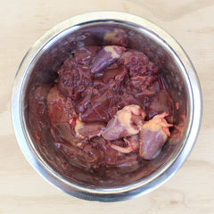 pheasant hearts and livers in a pet bowl