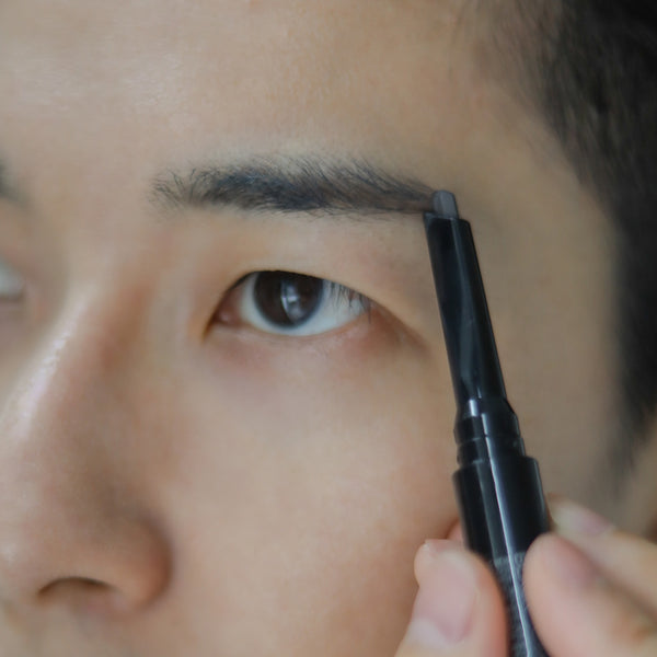 Enhance your eyes with an eyebrow pencil.