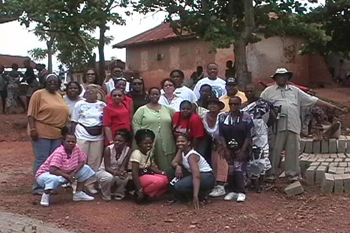 Posing At Sankofa_s Future Site for Village Economic Dev..jpg