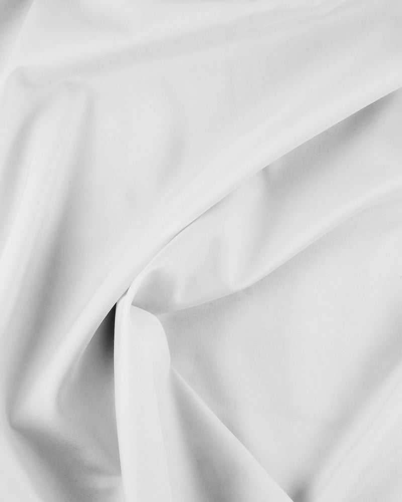top view of a slightly crumpled white bamboo sheet