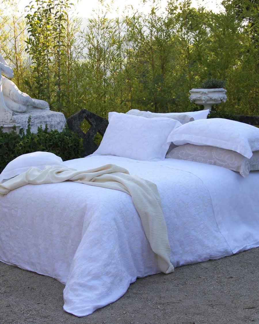 White Linen bedding set from Amalia Home Collection in the middle of nature.