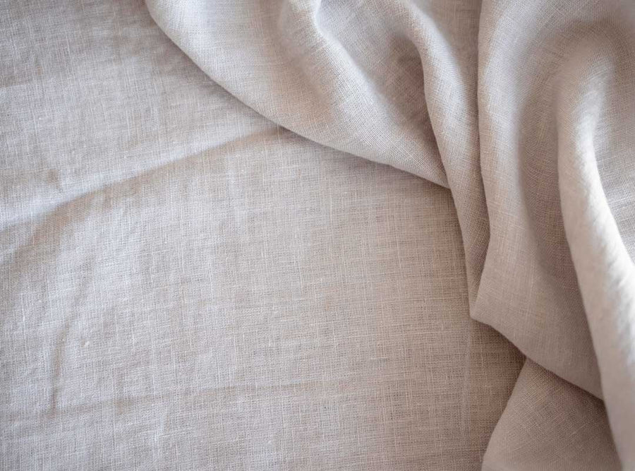 Close up of white Linen fabric from a sheet.