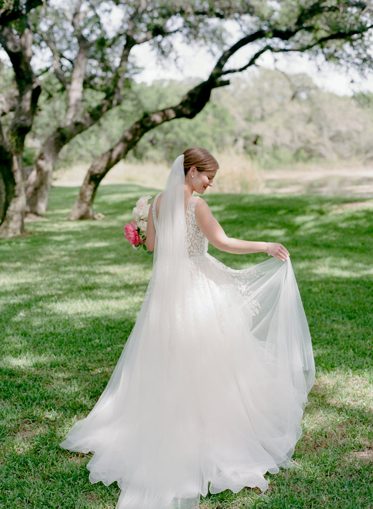 Ella Gown | Deep illusion V-neck ballgown with tulle skirt and ivory colored beading