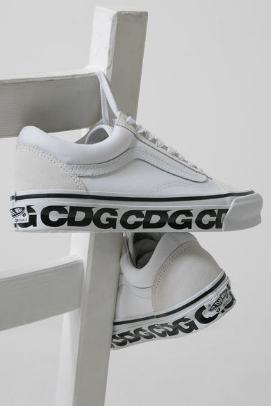 cdg black high top converse